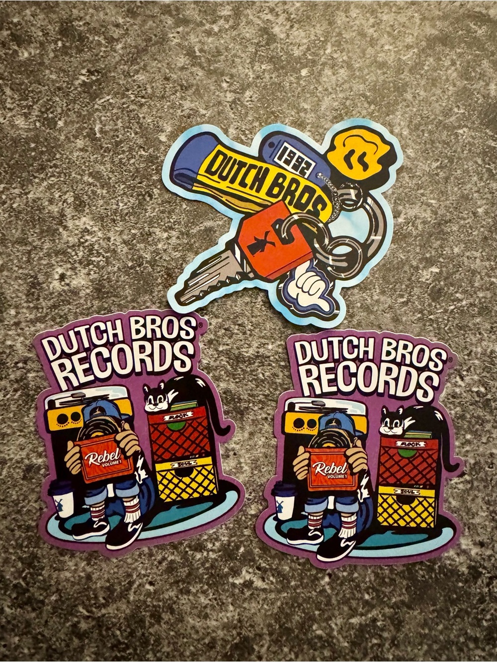 Dutch Bros Colorful Records Sticker Trio - Purple, Yellow, Red, Blue